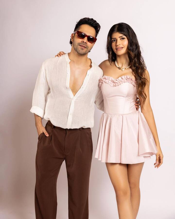 Varun looked sharp in a semi-formal ensemble with a white shirt and brown trousers.