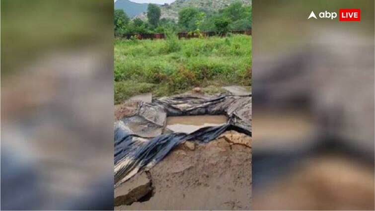 जयपुर में बांध टूटने से मची तबाही, पानी में बहने लगे कब्रिस्तान से निकलकर शव Dam breaking caused havoc in Jaipur dead bodies started floating in water after coming out of graveyard जयपुर में बांध टूटने से मची तबाही, पानी में बहने लगे कब्रिस्तान से निकलकर शव