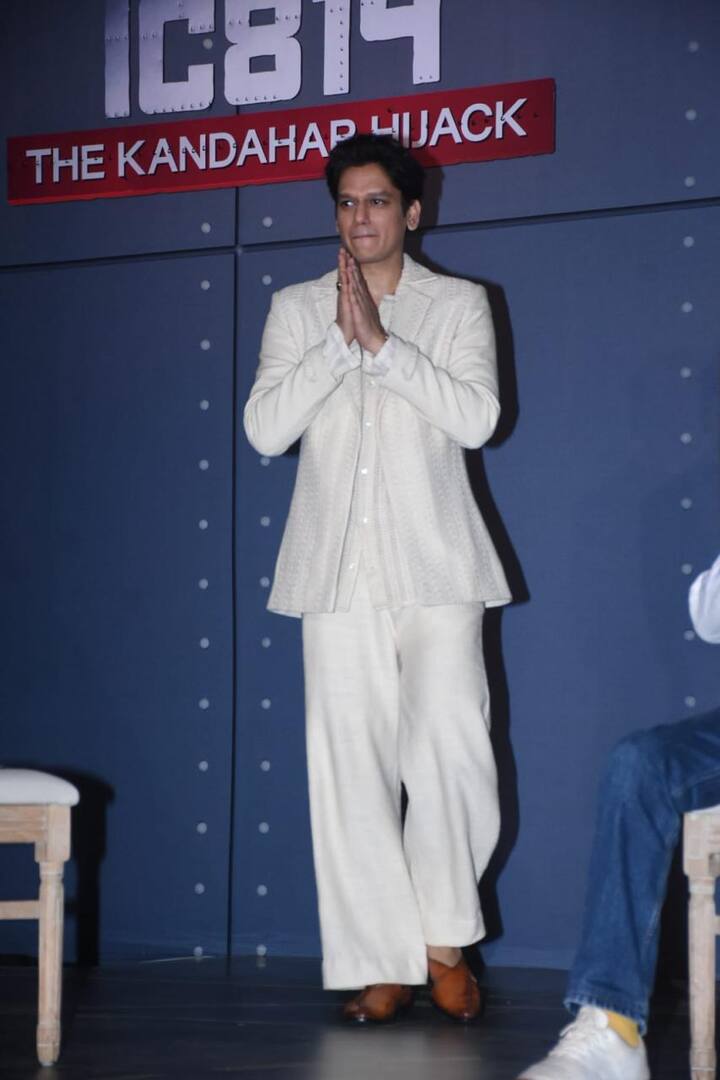 Vijay Varma, whom plays the role of pilot Devi Sharam, in a white pant suit looking dapper as ever.
