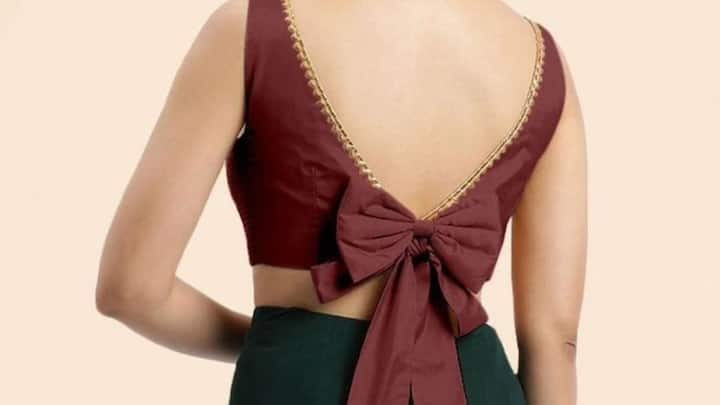 2. Blouse with bow on the back (Image source: Pinterest/outfitanaswara11)