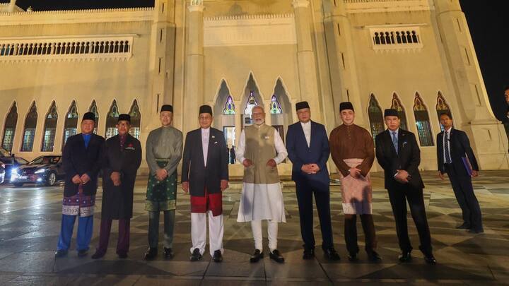 PM Modi with Brunei officials outside the Omar Ali Saifuddien Mosque, built by the father of Sultan Haji Hassanal Bolkiah. (Photo: X/@MEAIndia)