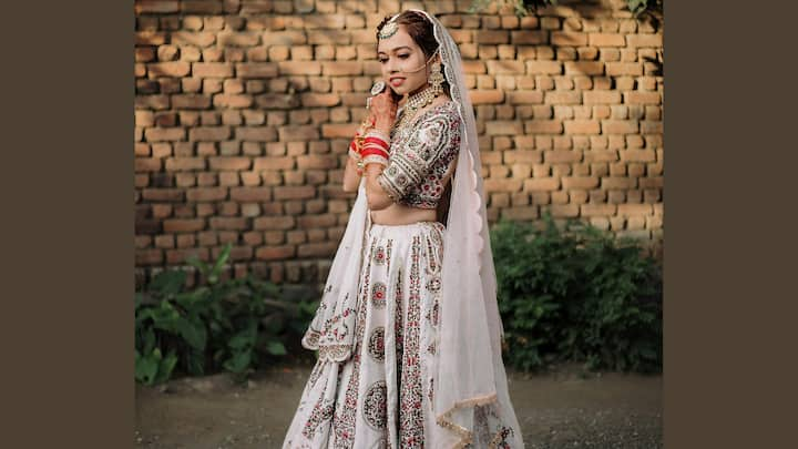 6. Multicoloured Printed Lehenga – Lehengas are pretty and versatile, especially during the festive seasons. However, why not try something different this Hartalika Teej? A multicoloured printed lehenga can make a place for itself in the wardrobe. With Janhvi Kapoor and Kiara Advani also trending in multicoloured outfits, it is certainly a fashion trend. By wearing this outfit as a statement piece, with delicate prints and a variety of colours, you are sure to turn heads during the festivities. Wear it with as little jewellery as possible so as not to take the attention away from the outfit. (Image Source: Canva)