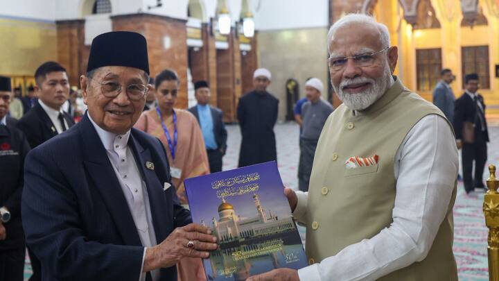 PM Narendra Modi at Brunei's iconic Sultan Omar Ali Saifuddien Mosque, where he was received by the country's Minister of Religious Affairs Pehin Dato Ustaz Haji Awang Badaruddin. (Photo: X/@MEAIndia)