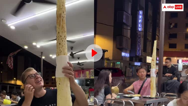 World tallest dosa is being served in a restaurant in Kuala Lumpur Malaysia videogoes viral Video: डोसा है या कुतुब मीनार? मलेशिया के रेस्टोरेंट का वीडियो हो रहा वायरल