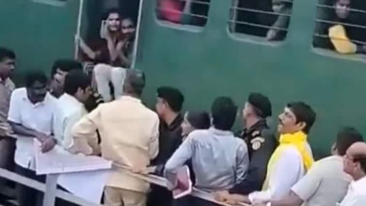 Chandrababu Naidu Andhra CM Narrowly Escapes Speeding Train During Flood Survey Ops WATCH WATCH: Andhra CM Chandrababu Naidu Narrowly Escapes Speeding Train During Flood Survey Ops