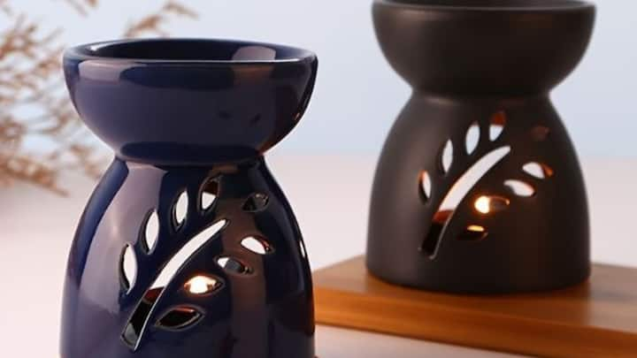 5. Candle Oil Burners – Candle oil burners are a combination of candle therapy and essential oils. When the candle is lit, the warm oil spreads the calming aroma throughout the room. Essential oils like cedarwood, bergamot, and marjoram are great for inducing sleep. The soft glow provided by burning candles also helps calm the nerves, making it the perfect end to a tough day. (Image source: Pinterest/ads_fb40)