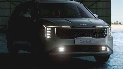 New Kia Carnival teased ahead of launch in indian automobile industry Kia Carnival 2024: எம்பிவி பிரியர்களே..! லுக்கிலேயே மிரட்டும் கியா கார்னிவல்..! சந்தைக்கு வரும் தேதி தெரியுமா?