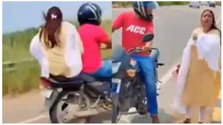 ਔਰਤ ਨੂੰ ਬਾਈਕ ਮਗਰ ਬਿਠਾ ਲੈ ਜਾ ਰਿਹਾ ਸੀ ਨੌਜਵਾਨ, ਕਾਰ ਸਵਾਰਾਂ ਨੇ ਦੇਖਦੇ ਹੀ ਕਿਹਾ- 'ਇਸ ਨੂੰ ਉਤਾਰ ਦਿਓ'...VIDEO ਦੇਖ ਸਮਝ ਆਵੇਗਾ ਮਾਮਲਾ