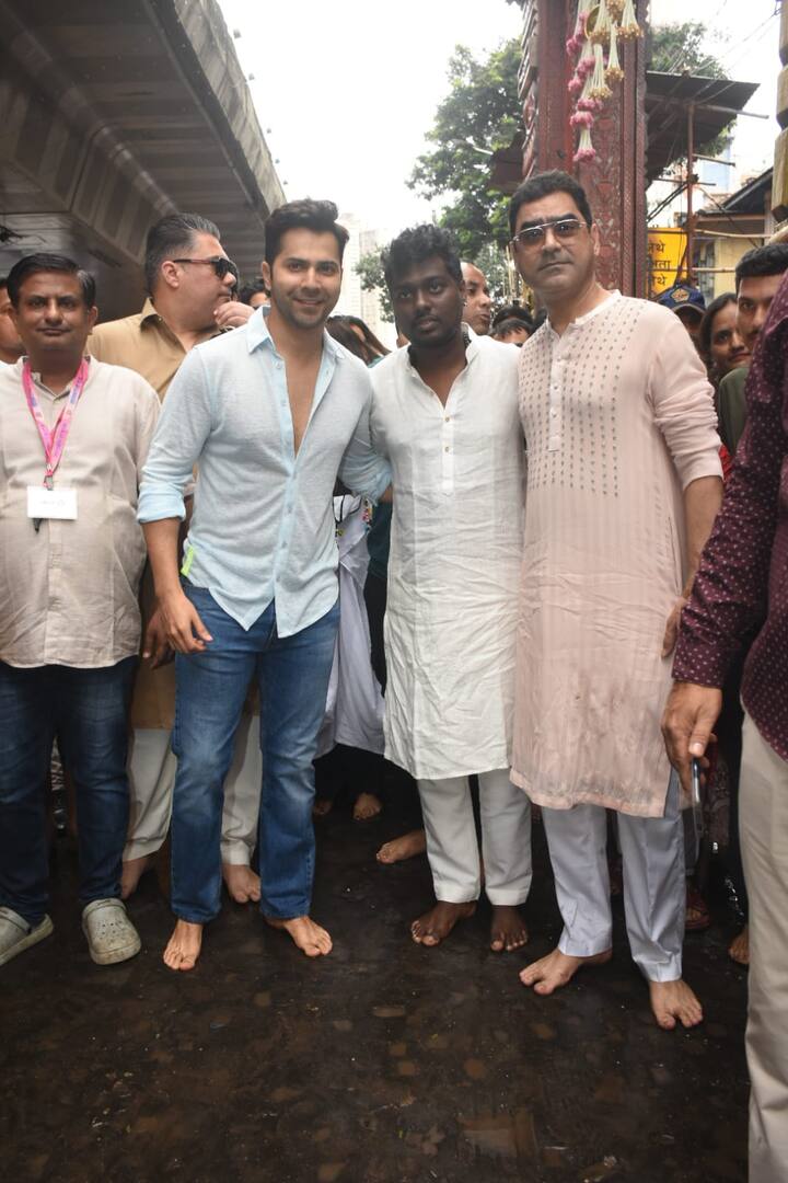 Varun and Atlee were also clicked by paparazzi as they walked towards the temple barefoot. (Image: Manav Manglani)