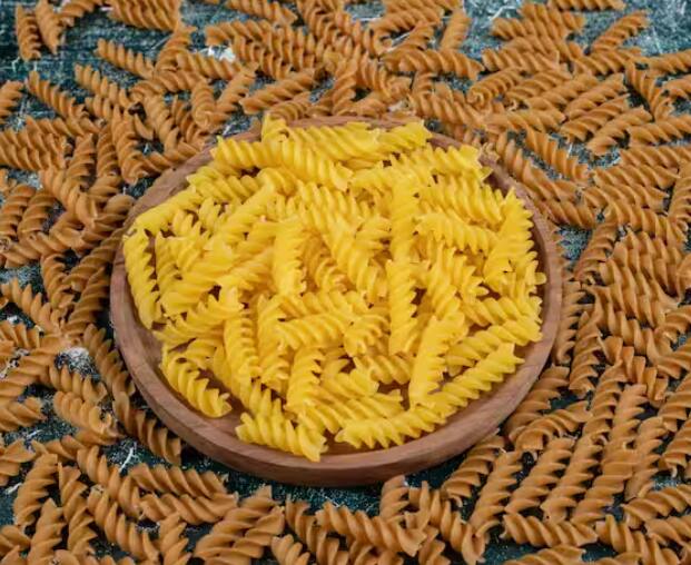 To make macaroni, first boil water in a pan. Add salt and macaroni to this water. When it boils, filter it in a sieve and let it cool.