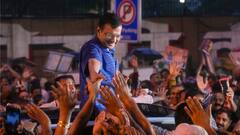 Delhi CM Kejriwal Embraces Family & AAP Colleagues, Greets Supporters Awaiting His Release In Rain — PHOTOS