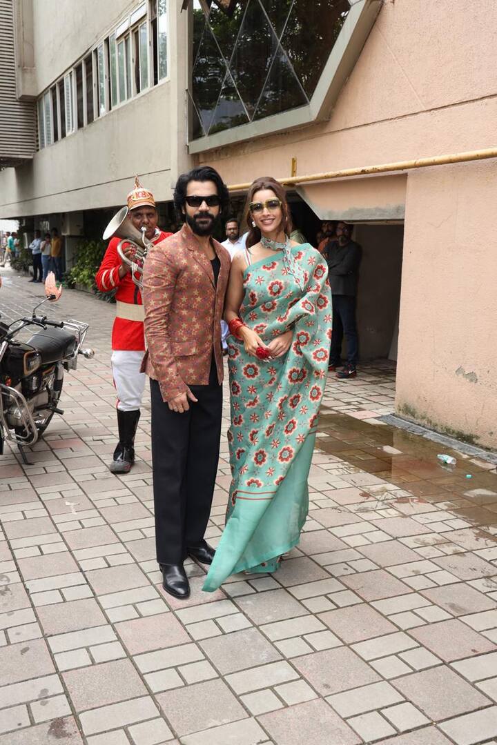 In his brown flowery jacket and black straight pants, Rajkummar complemented Triptii.