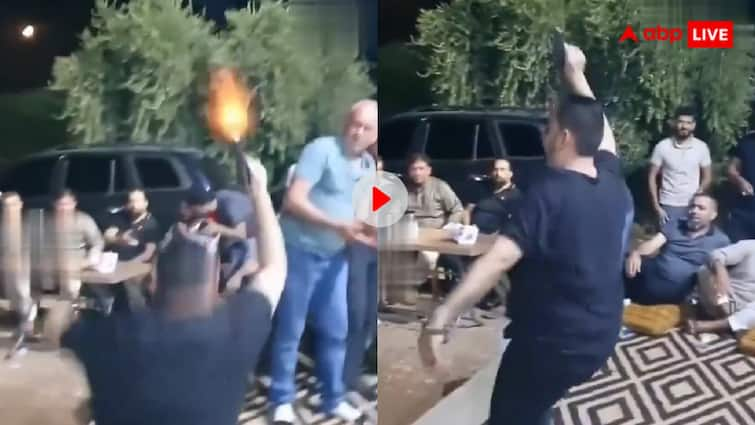 Video of man firing indiscriminately while dancing is going viral ये होता है असली पागलपन- पार्टी के बीच हवा में फायर करता रहा शख्स, जान बचाने के लिए भागे लोग