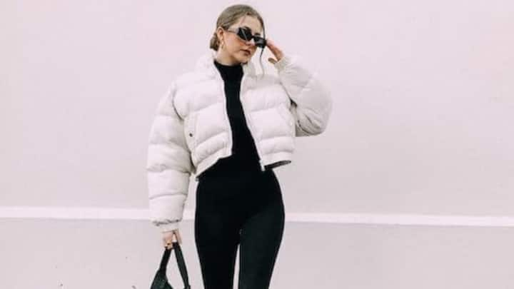 5. Puffer Jacket: Opt for a puffer jacket to stay warm and comfortable during outdoor adventures or casual outings. Pair it with warm boots and a knitted hat for a beautiful and comfortable winter outfit. (Image Source: Pinterest/girlsharestipsofficial)