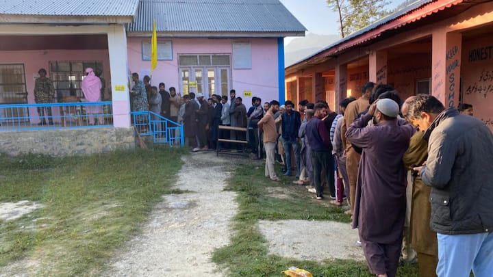 Early morning voters queue up to vote at a polling booth in Devsar, Kulgam. Constituencies voting on Wednesday include those in Anantnag, Kulgam and Shopian districts, apart from others. (Photo:@ceo_UTJK)