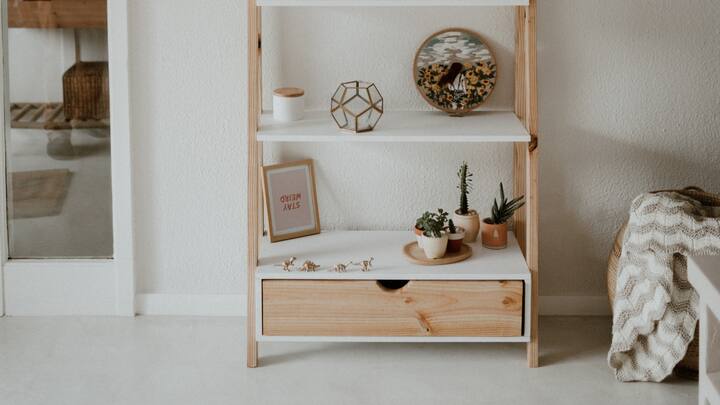One sensation in sustainable home decor is the use of reclaimed and recycled materials. For example, reclaimed wood is steadily more popular for furniture and flooring. It helps reduce the need for new timber and often brings a unique character to a space. Similarly, recycled metals and glass are being remodeled into stylish light fixtures, countertops, and decorative accents, proving that sustainability does not mean giving up on style or function. (Image source: Canva)