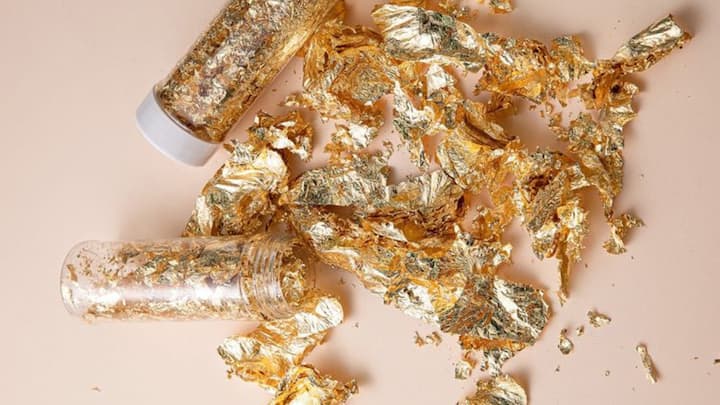 Gold foils are ultra-thin sheets used to add a chic, luxurious touch to various surfaces like paper, fabric, and glass, making them perfect for modern designs appealing to diverse tastes.