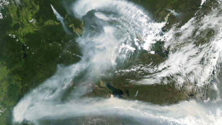ZILLIONS OF SMOKE PARTICLES: Wildfire smoke over Canada on July 11, 2012, was captured by the Moderate Resolution Imaging Spectroradiometer (MODIS) aboard NASA’s Aqua satellite. Photo: NASA