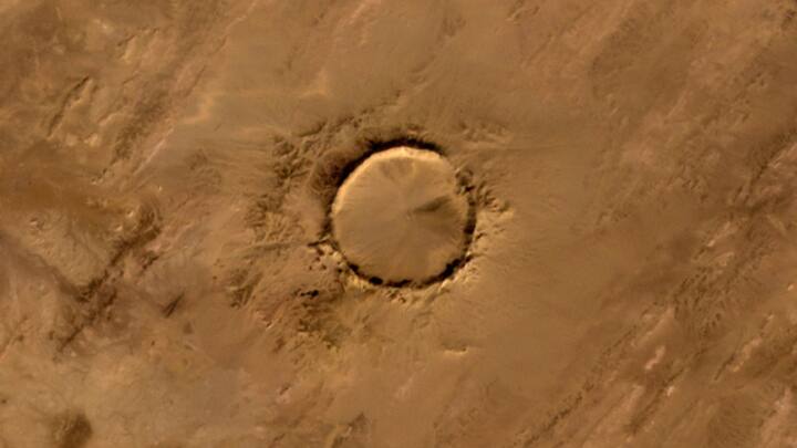 OH SO PERFECT! On January 24, 2008, NASA’s Terra satellite, using the Advanced Spaceborne Thermal Emission and Reflection Radiometer (ASTER), captured this striking image of the Tenoumer meteorite crater in Mauritania, formed between 10,000 and 30,000 years ago. Photo: NASA