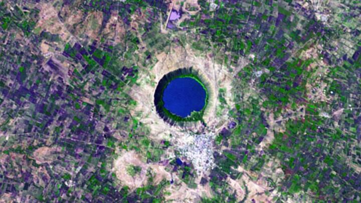QUITE A 'Q': This image of India’s Lonar Crater, formed by a meteorite impact, was acquired by the Advanced Spaceborne Thermal Emission and Reflection Radiometer (ASTER) aboard NASA’s Terra satellite on November 29, 2004. The presence of shocked quartz hints at the intense force of the impact. Photo: NASA
