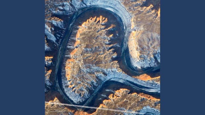 'A' IN THE CURSIVE: On January 22, 2014, an astronaut aboard the International Space Station photographed Utah's Green River as it looped back on itself, showcasing a striking geological feature called Bowknot Bend. Photo: NASA