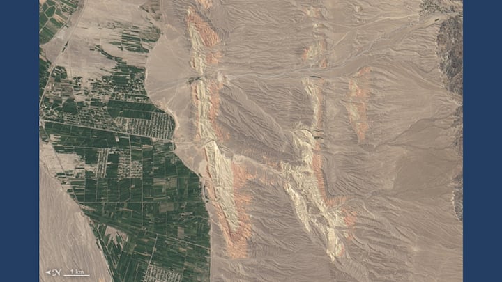 H(OLI) MOLEY, THAT'S AN 'H'! On August 30, 2014, rivers cutting through colourful ridges in southwestern Kyrgyzstan were captured by the Operational Land Imager (OLI) on Landsat 8. Photo: NASA