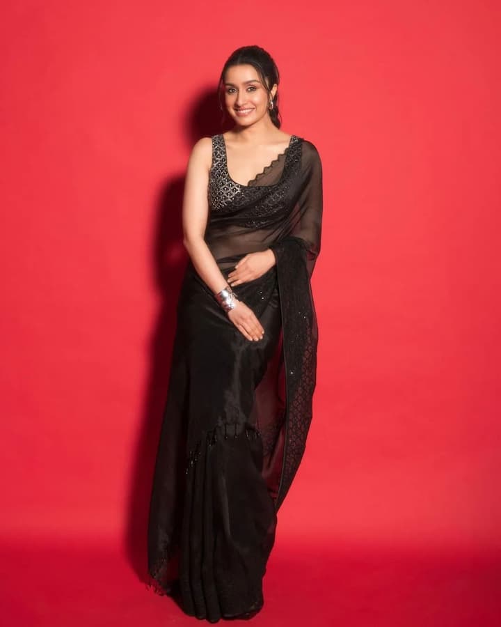 The chic black saree is perfect for transitioning from casual daytime wear to evening celebrations with just a few tweaks. We especially loved the zig-zag edges that added a unique touch to the look.