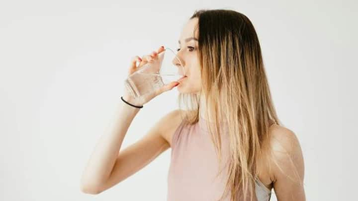 4. Stay Hydrated And Nourished: Dehydration and poor nutrition can exacerbate pain and fatigue. Keep a water bottle at your desk and opt for healthy snacks or fruits to maintain your energy levels throughout the day. (Image Source: Pinterest/fgkldufjk)