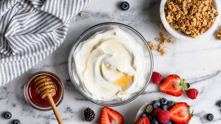 7. Greek Yogurt (Thick Dahi): Greek yogurt is high in protein, low in fat, and contains probiotics that aid digestion. Suggested Dish: Greek Yogurt with Nuts and Seeds – A quick, protein-rich snack that also provides healthy fats. (Image source: Pinterest/ Plays Well With Butter)