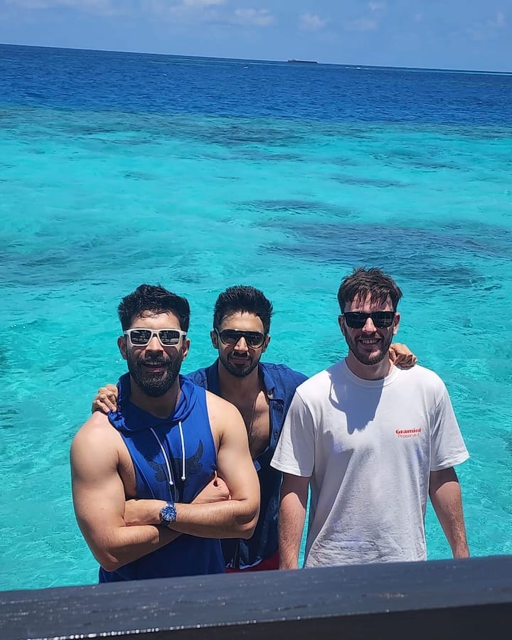 She also posted picture of her husband Suraj Nambiar posing with their friends.