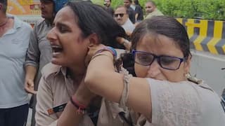 Fell on the ground, pulled hair and tore her uniform, woman clashed with RPF lady constable in the middle of the road