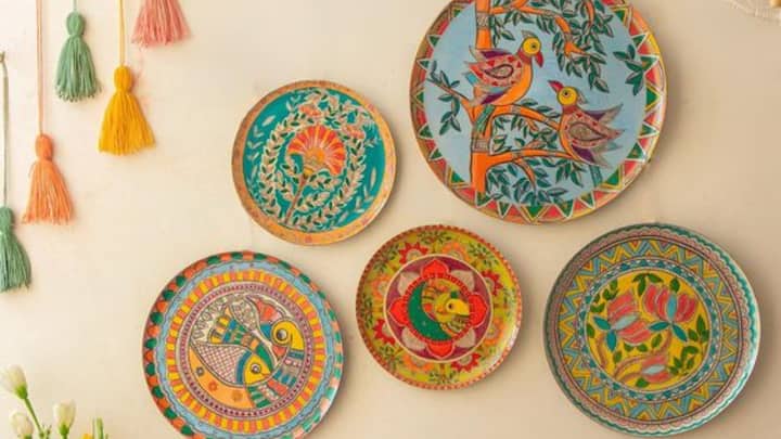 4. Wall Hangings: To further elevate the room's vibe, consider adding wall hangings that complement the refined look of the room. These accents will not only enhance the visual appeal of the walls but also tie together the entire space. (Image Source: Pinterest/amazon)