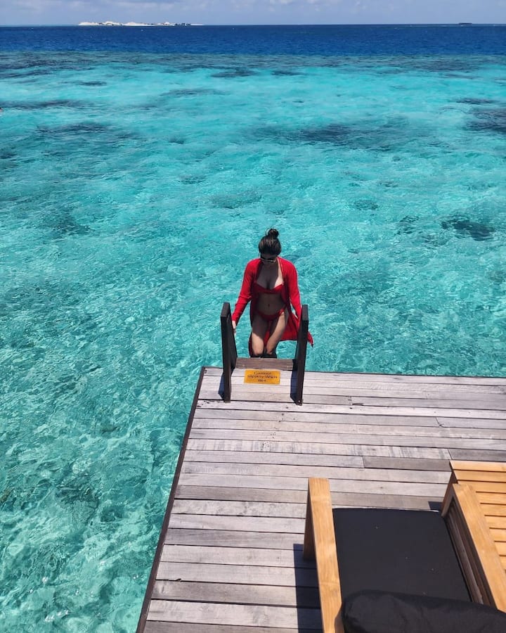 The actor also took a dip in the water in red hot bikini.
