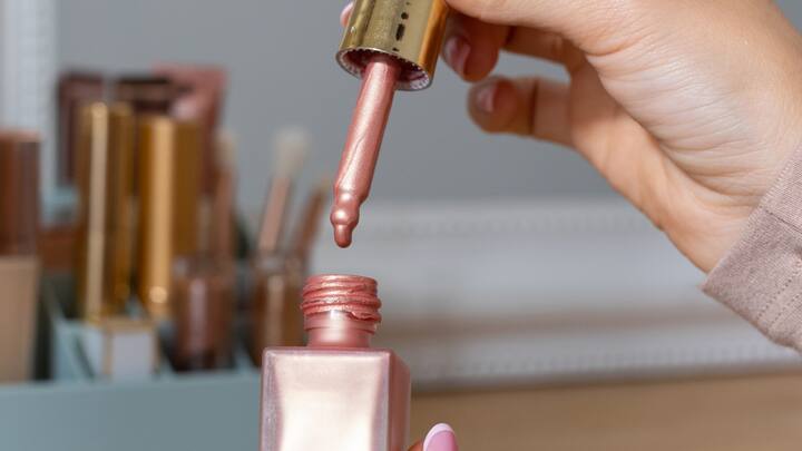 Highlighter: Next, sweep a highlighter along your cheekbones, down the bridge of your nose, and on your cupid’s bow. This will add a luminous touch to your face and catch the light during the festivities.  (Image source: Canva)