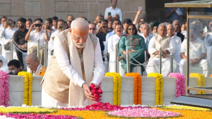 Prime Minister Narendra Modi pays homage to Mahatma Gandhi on Gandhi Jayanti, at Rajghat in New Delhi. To mark the day, he took part in Swachhta-related activities with school children. He urged everyone “to also take part in some or the other such activity during the day and, at the same time, keep strengthening the Swachh Bharat Mission”. (Photo: PTI)