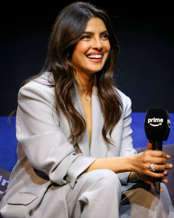 Priyanka paired the blazer with a deep V-neckline waistcoat, adding sultry sophistication to the ensemble.