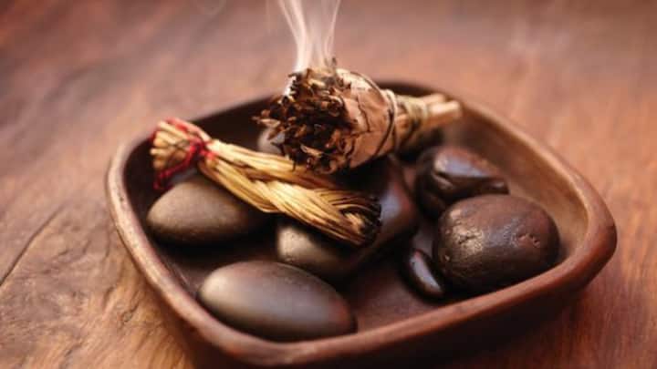 1. Smudging: Smudging involves the burning of herbs for cleansing which is done with flowers, and generally sage, adapted to for extinguished individuals post eclipse sweeps away bad merits gained during these events. The herbs are are well known to clean spaces and revitalise. (Image Source: Pinterest/fractalenlight)