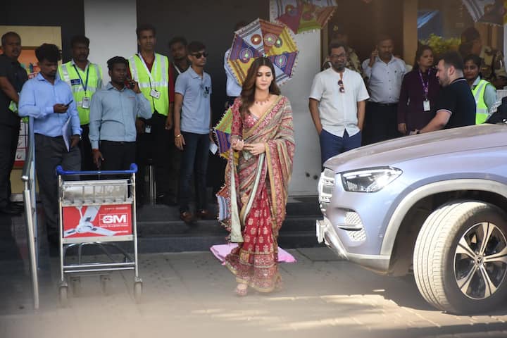Kriti Sanon was also seen at the airport in a multi-coloured saree.