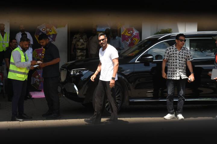 Ajay was seen sporting white t-shirt and black pants.