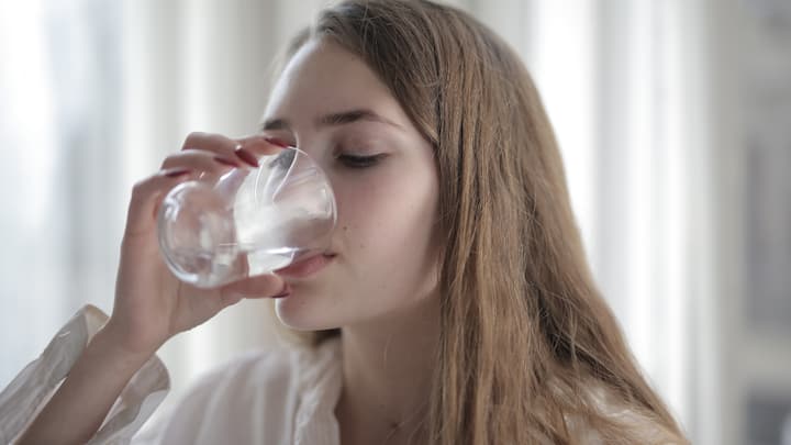 2. Hydration Is Key: Drinking plenty of water is essential for maintaining healthy, plump skin. Aim to drink at least 8 glasses of water a day to help flush out toxins and keep your skin hydrated from the inside out. Proper hydration can also improve your skin's elasticity and overall appearance. (Image Source: Canva)