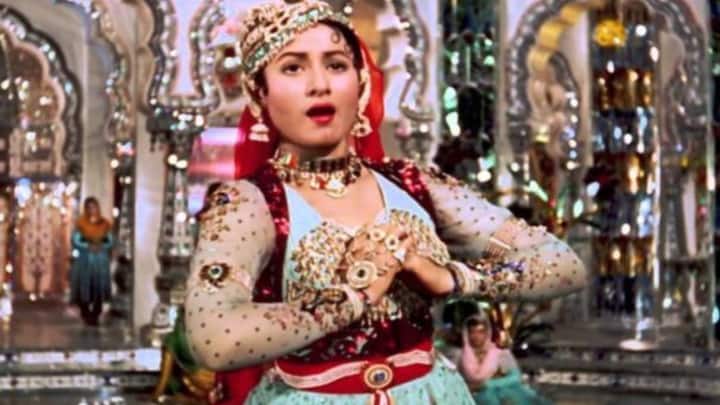 Madhubala in Mughal-E-Azam: Madhubala's timeless look in the iconic song 'Jab Pyaar Kiya To Darna Kya' made the light blue and red embellished anarkali a fashion staple. This regal style, with its flared silhouette and intricate details, has remained a favourite among women of all ages, becoming a quintessential part of Indian ethnic fashion. (Image source: Pinterest/ Film Inquiry)