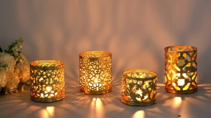 2. Incorporate Lights And Lanterns: Lights-in and out, as well as lanterns and diyas are the crux of festive look. Hang them on staircases, windows, doors and other areas where everybody can see them to enhance the ambience. (Image Source: Pinterest/ads_fb12)