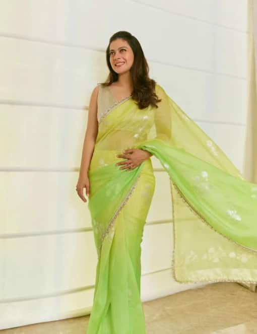 Kajol's green saree look is also amazing. This shimmery saree can be a perfect choice in the festive season.