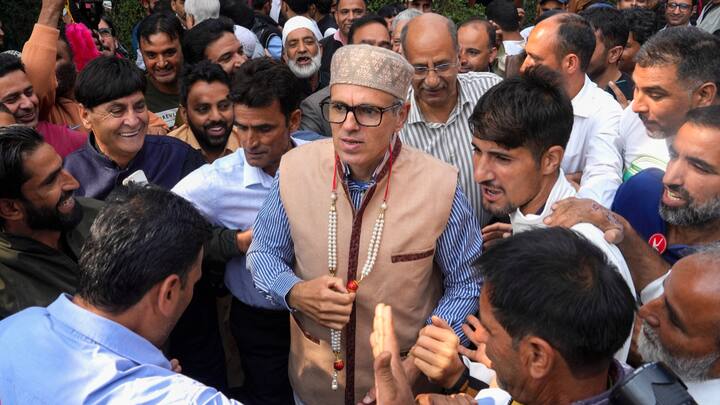 Jammu & Kashmir National Conference (JKNC) vice-president Omar Abdullah is greeted by party workers at his residence after the party emerged as the biggest player in the 2024 assembly elections. Former CM Omar Abdullah won Budgam by over 18,000 votes and Ganderbal by around 10,000 votes. (Photo: PTI)