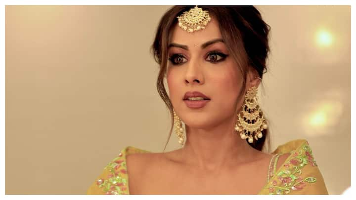 Nia Sharma shared a series of photos on her Instagram in a yellow coloured lehenga giving a festive vibe.