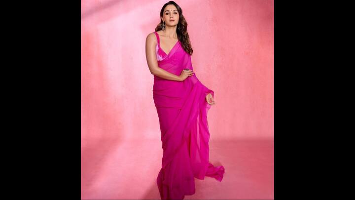 5. Alia Bhatt: Alia looks stunning in a velvet blouse that goes well with her simple yet elegant pink saree. Her simplistic yet striking style is something that looks perfect for the festive season. Her drape, which flows effortlessly and is ideal for a modern yet traditional look. (Image Source: Twitter/@filmfare)