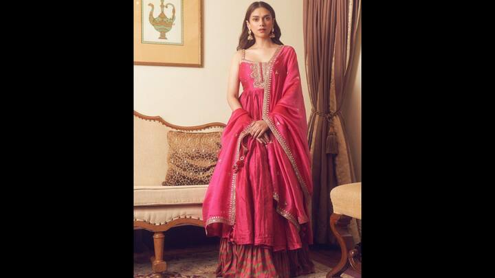 4. Aditi Rao Hydari: Aditi radiates style while wearing a richly detailed deep pink Anarkali with gold accents. The combination combines a hint of regality with traditional charm. Her attire is completed with a dupatta with beautiful lace. (Image Source: Twitter/@telugufilmnagar)