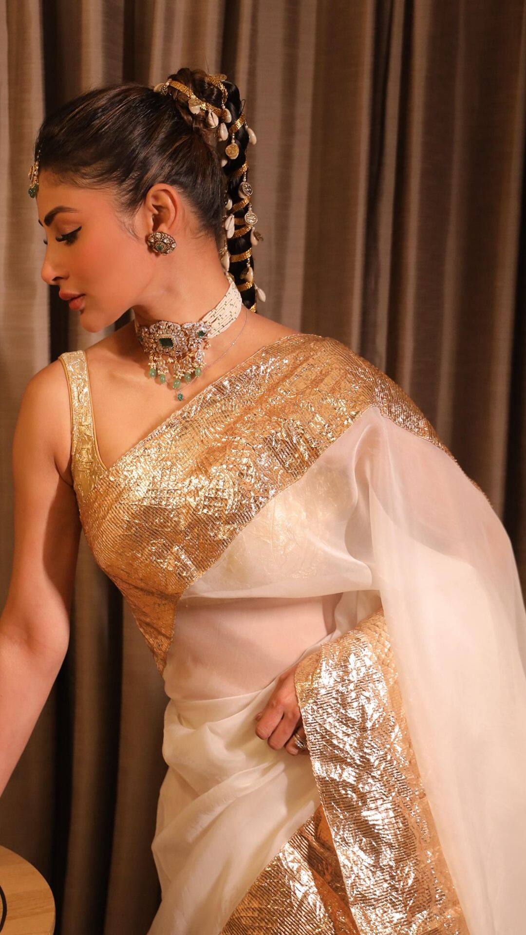 Mouni Roy Shows Her Festive Glam In White And Gold Saree