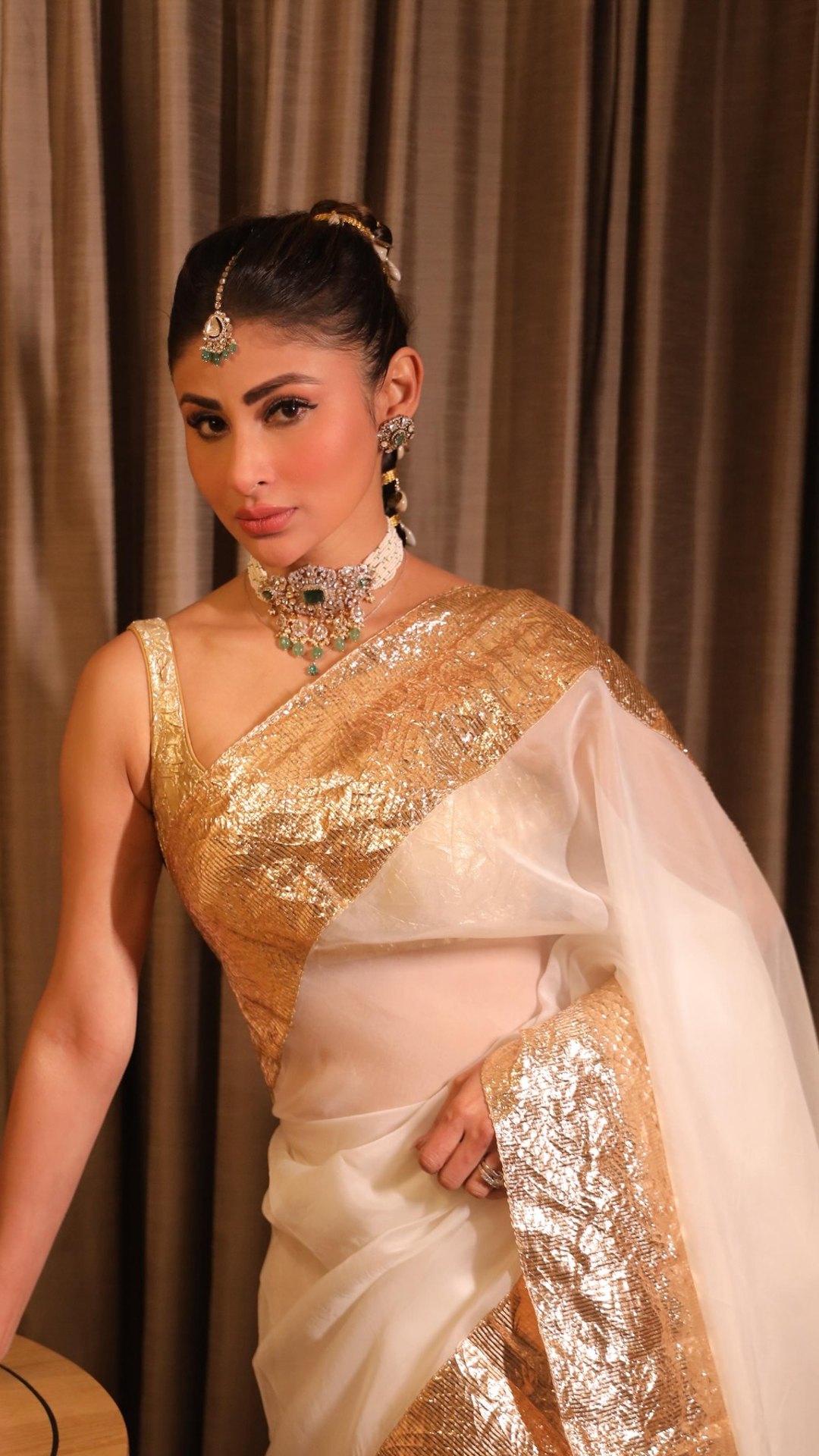 Mouni Roy Shows Her Festive Glam In White And Gold Saree