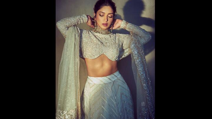 1. Bhumi Pednekar: Bhumi looks stunning in a lavishly embellished lehenga. She looks gorgeous and striking for the festive season with her matching dupatta complementing the silver embellishments. She has also worn heavy jewellery that goes well with her outfit. (Image Source: Twitter/@filmfare)